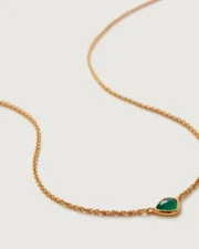 Gold necklace with teardrop green gemstone