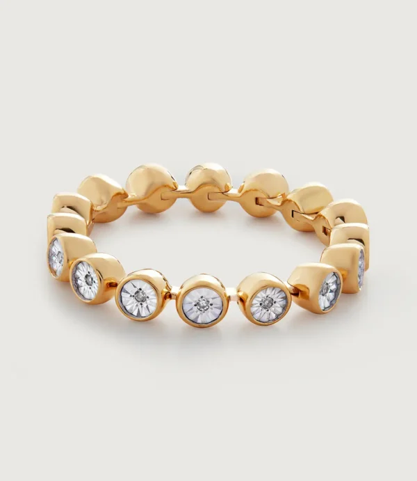 Gold bracelet with round bezel-set diamonds