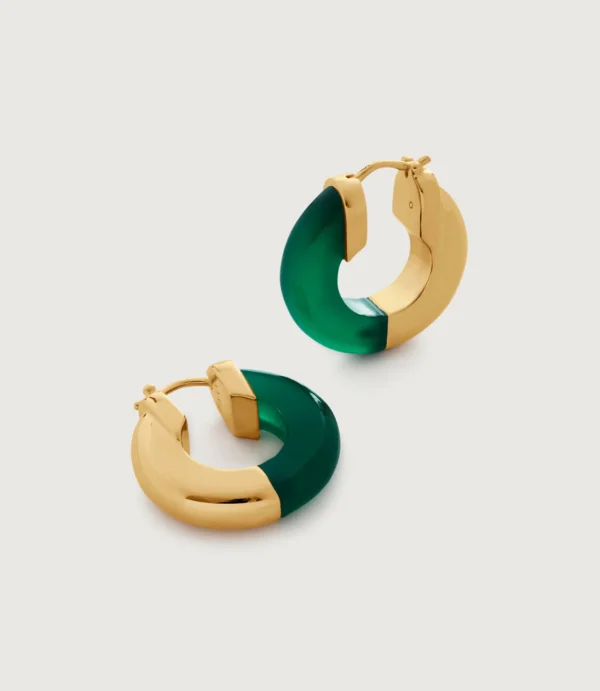 Gold and green hoop earrings on white
