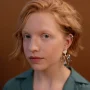 Portrait of person with silver earrings