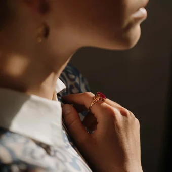 Close-up profile of person with red ring